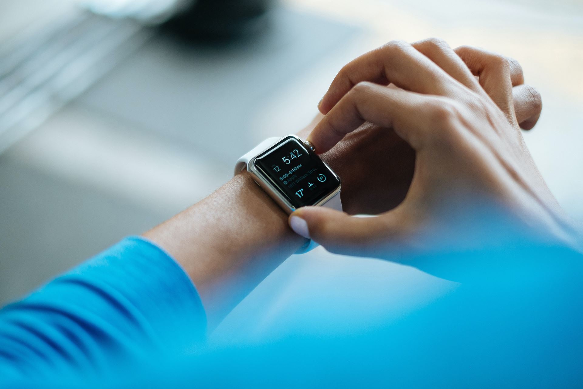 a person checking their wristwatch